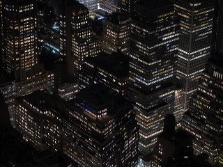 high-angle-shot-beautiful-lights-buildings-skyscrapers-captured-night